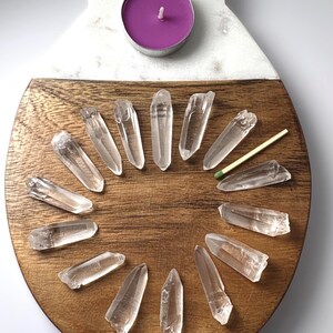 Material: Quartz 
Variety: Lemurian Seed Quartz Crystals 
Quantity: 15
Weight: 68.97 grams
Country of origin: Brazil
Ships from : USA