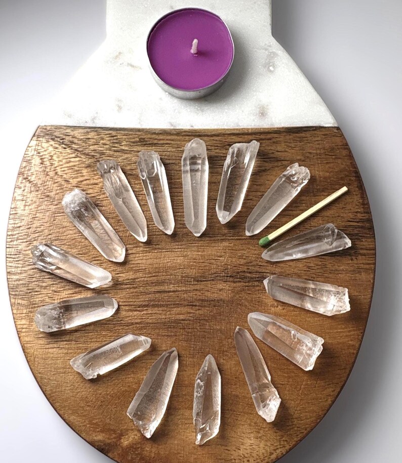 Material: Quartz 
Variety: Lemurian Seed Quartz Crystals 
Quantity: 15
Weight: 68.97 grams
Country of origin: Brazil
Ships from : USA