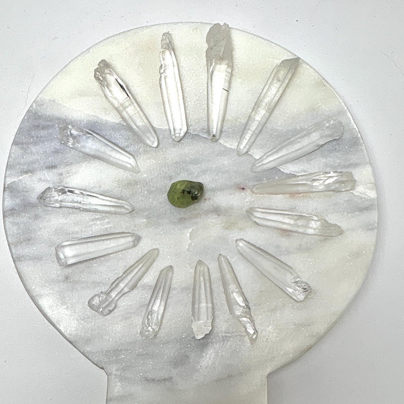 Material: Quartz 
Variety: Lemurian Seed Quartz Crystals 
Quantity: 15
Weight: 42.2 grams
Country of origin: Brazil
Ships from : USA