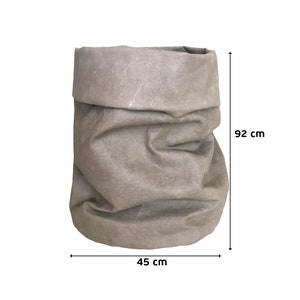 May include: A gray, paper-like storage bag with a rolled-down top. The bag is 45 cm wide and 92 cm tall. The bag has a textured appearance and is designed to stand upright. The bag is empty and sits against a white background.