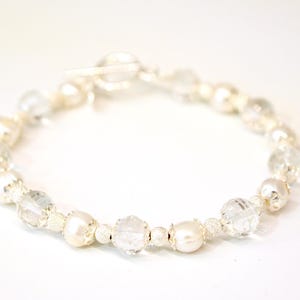 Bracelet in real silver, crystals and baroque pearls
