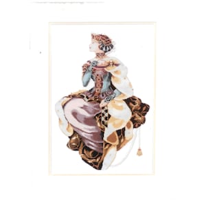 May include: A cross-stitch design of a woman in a Renaissance-style gown. The artwork features a seated figure in profile, wearing a detailed dress with shades of blue, brown, and gold. The design is framed in a white border.