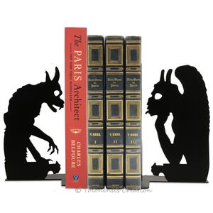 Metal bookends Notre Dame de Paris,gargoyle monster Stryge,chimera mitologia,gothic cathedral style,mythical creatures,medieval sculptures