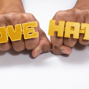 Love hate four finger best sale rings