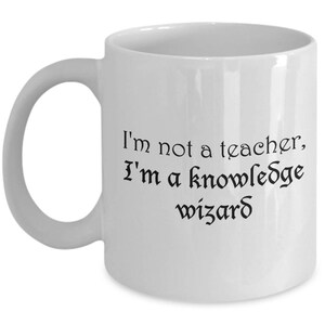 I'm Not a Teacher, I'm a Knowledge Wizard coffee mug