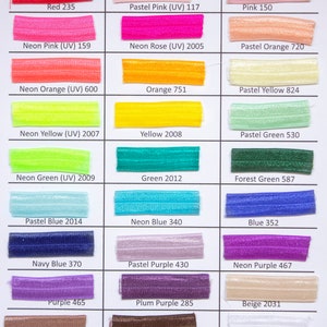 May include: A color chart with 24 different colors of elastic. The colors are arranged in three columns and eight rows. Each color has a name and a number code. The colors include red, pink, orange, yellow, green, blue, purple, brown, white, grey, and black.