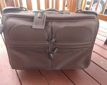 tumi leather luggage