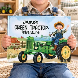 Może przedstawiać: Książka dla dzieci w twardej oprawie zatytułowana Jame's GREEN TRACTOR ADVENTURE. Okładka przedstawia akwarelową ilustrację dziecka w ogrodniczkach i słomkowym kapeluszu prowadzącego zielony ciągnik na farmie z krową i kurczakami w tle.