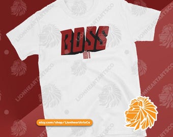 May include: White t-shirt with a red 3D graphic that says "BOSS" with the word "NOTU" underneath.