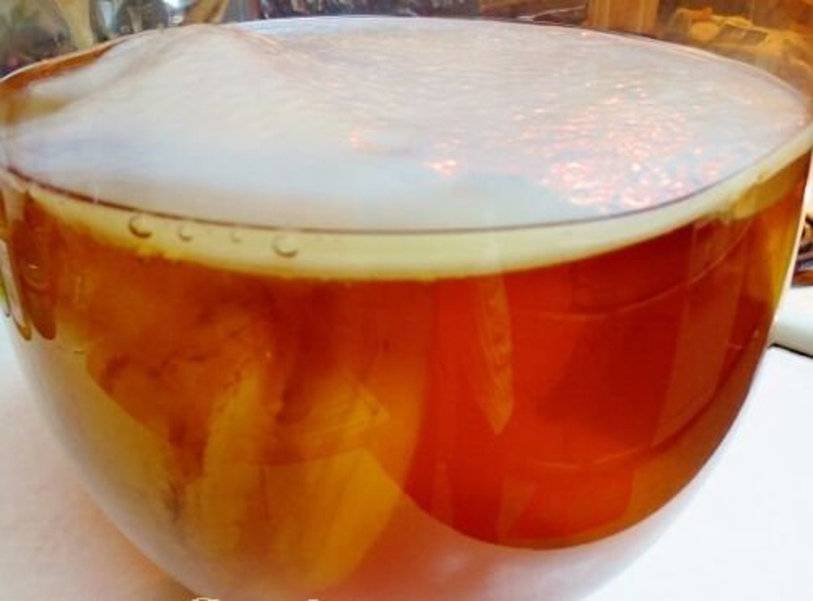 чайный гриб 90х. напиток из чайного гриба 7. напиток из чайного гриба 7. чайный гриб картинки. напиток на чайном грибе комбуча.