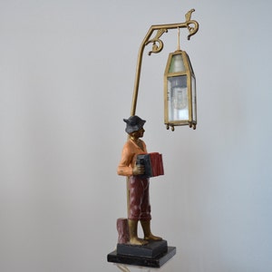 Table lamp with accordion player, metal, ca. 1930 hand-painted with marble base