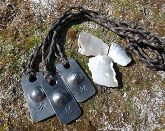 Firesteel pendant. Bow drill socket.