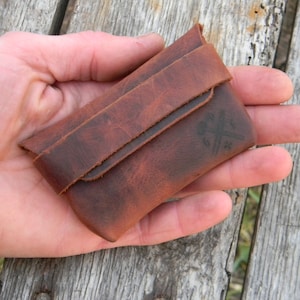 Flint and steel in leather pouch. image 4