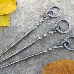 Forged medieval viking pin, fork.