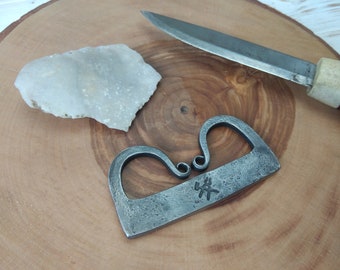 Traditional bushcraft flint and steel. Steel striker and flint.