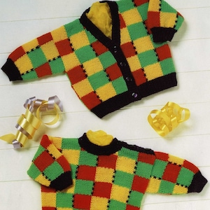 May include: Two knitted baby sweaters with a checkered pattern in red, yellow, green, and black.