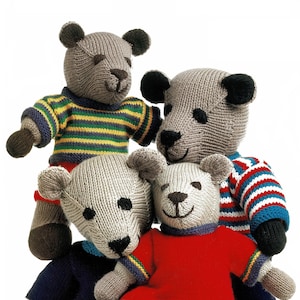 May include: Four knitted teddy bears wearing colorful striped sweaters. The bears are gray with black eyes and noses.