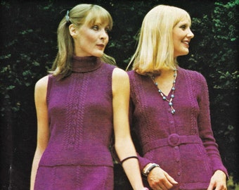 May include: Two women wearing purple knitted dresses. The woman on the left is wearing a sleeveless dress with a turtleneck and a skirt. The woman on the right is wearing a long-sleeved dress with a belt and a skirt. The text "BELLMANS 4 ply Sizes 32 to 38" is visible at the bottom of the image.
