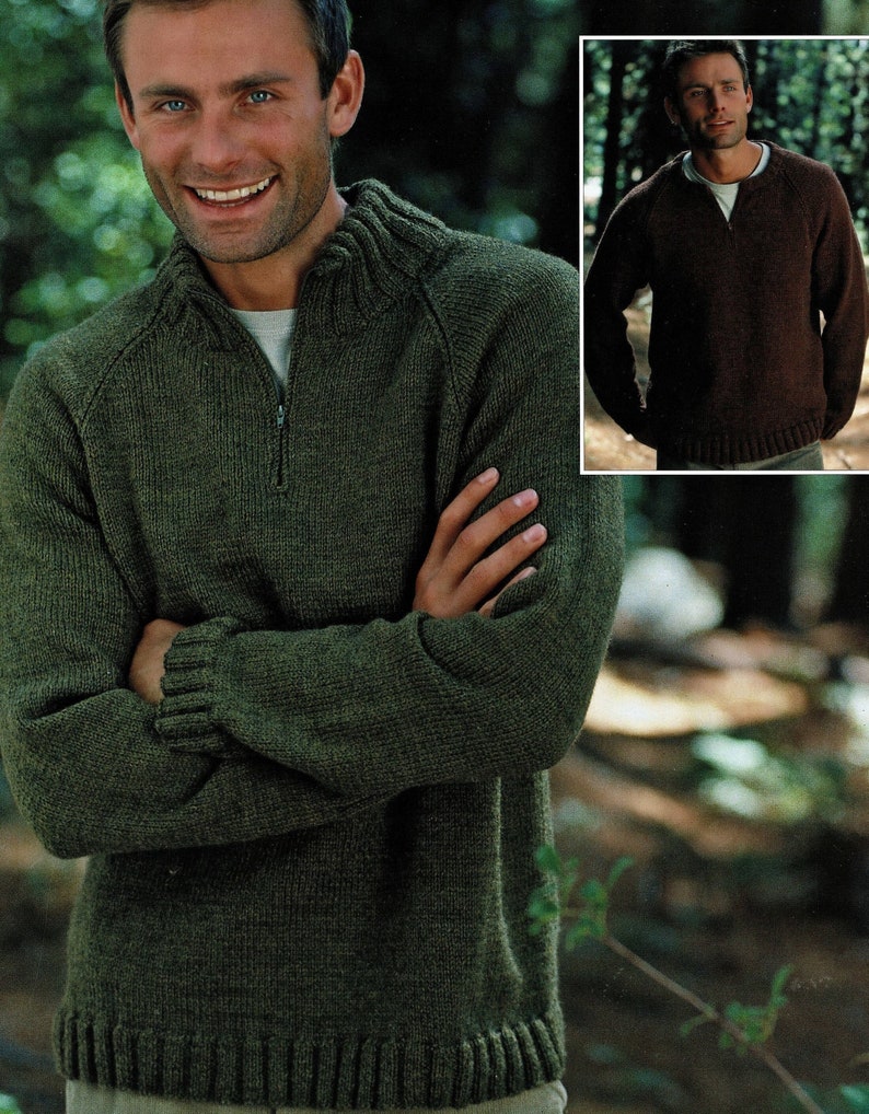 May include: A green knitted sweater with a zippered neckline. The sweater has a ribbed collar, cuffs, and hem.