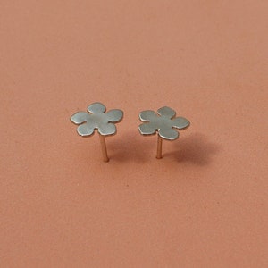 flower silhouette ear studs, sterling silver