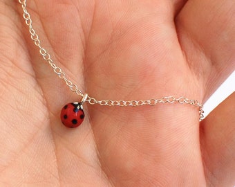 ladybug pendant on a silver chain