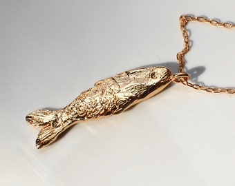 gold fish charm necklace, gold plated pendant on a chain