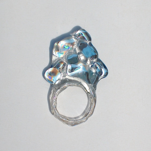clear resin and silver ring with CD cut outs, holographic statement piece