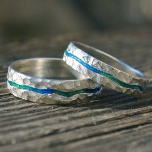 a pair of wedding bands, river wedding bands, one of a kind wedding bands