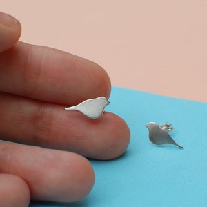 silver bird stud earrings