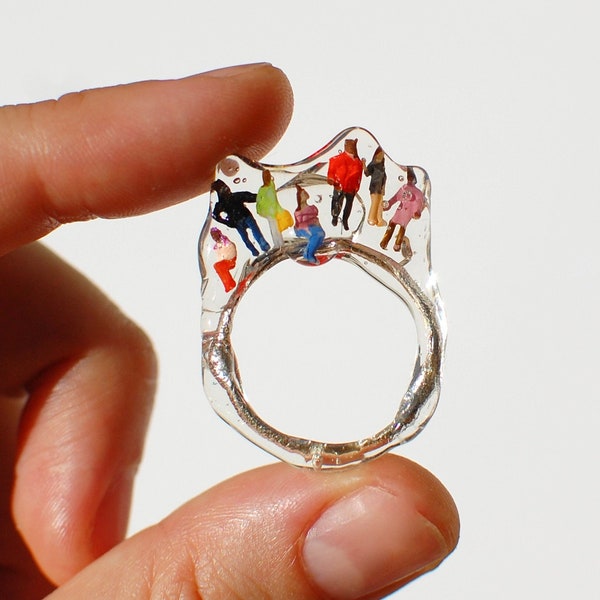 people stuck in jelly, resin and sterling silver statement ring with miniature people figurines