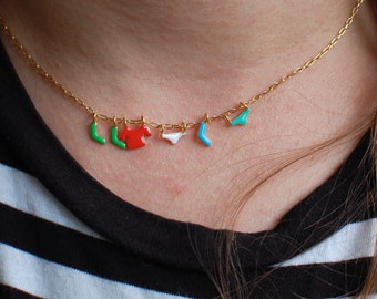 gold plated laundry necklace on a chain, colorful enamel charms, fun jewelry