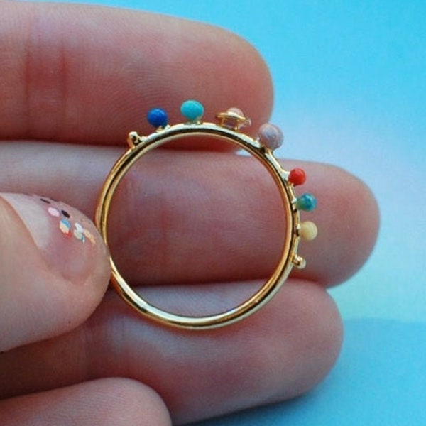 mini solar system ring in gold color, gold plated, planets, cosmos, galaxy, geek jewelry