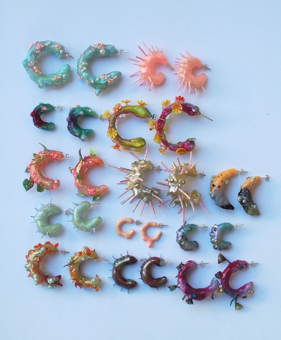 a collection of blobby fun hoop earrings choose one