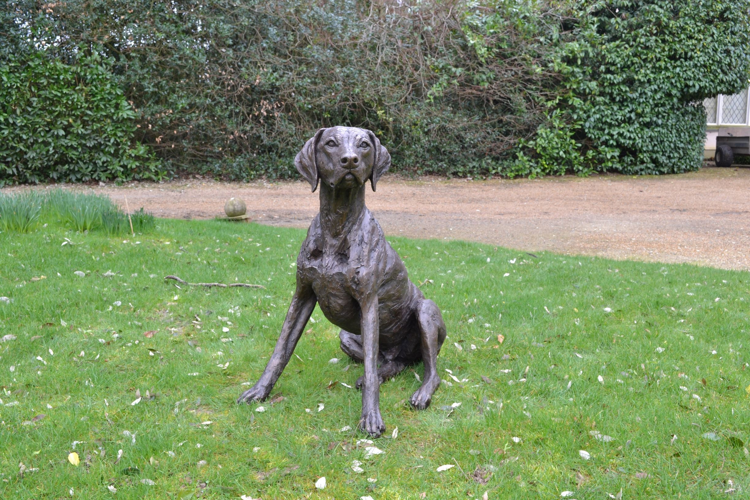pointer garden statue