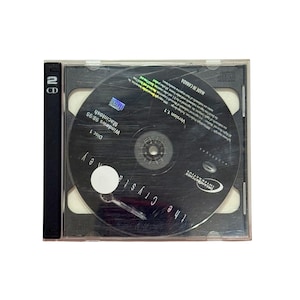 May include: A clear plastic CD case containing a black CD labeled "The Crystal Key" and "Disc 1". The CD is for Windows 98/95 and Macintosh. The case also has a black spine with "2 CD" printed on it.