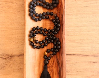 108 Black Onyx, Tiger Eye and Black Lava Stone. Hand knotted 108 beads Mala with Handmade Cotton Tassel.