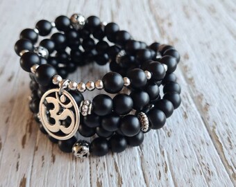 Matte Onyx Om Mala  stretch mala with artisan om charm, black onyx wrap bracelet.