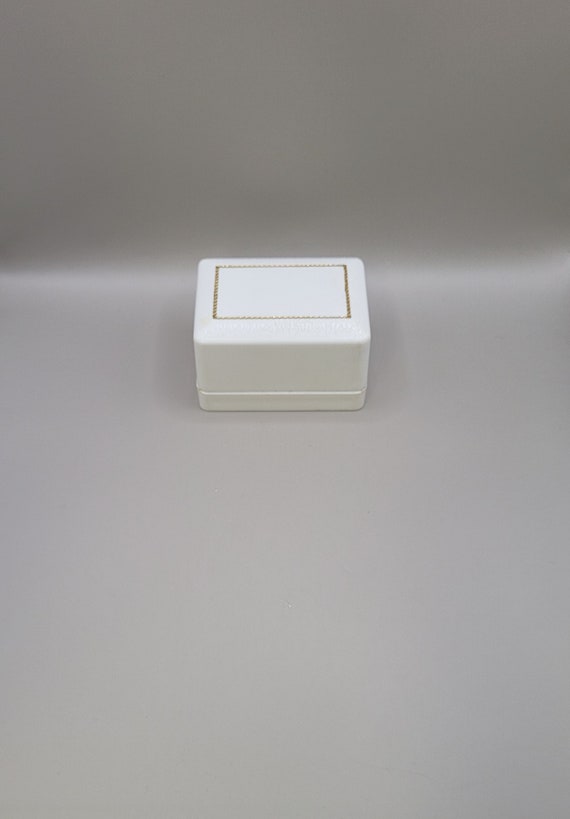 White Plastic Ring Box With Blue Velvet Lining