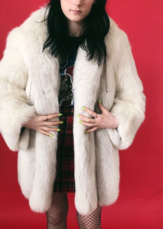 silver fox fur coat value