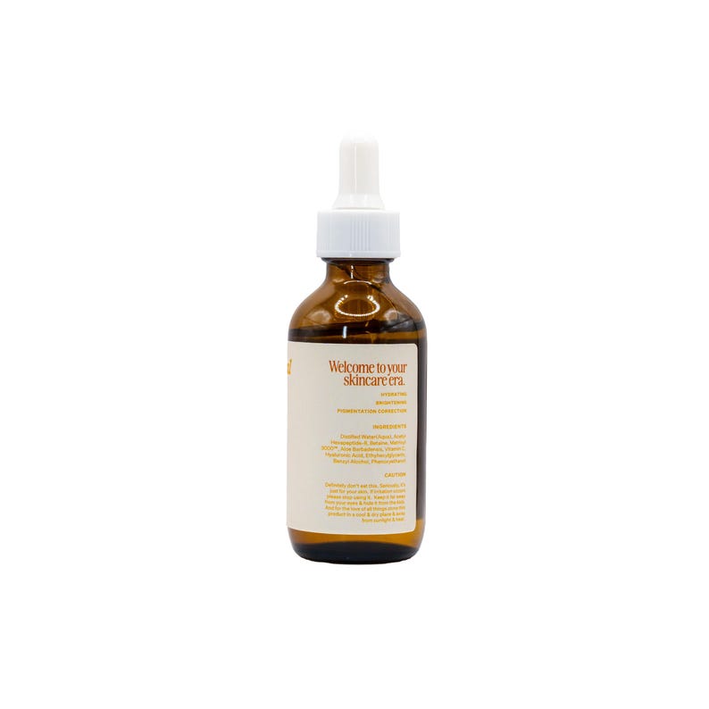May include: A brown glass skincare serum bottle with a white dropper and cap. The label reads "Welcome to your skincare era." The bottle contains a clear liquid. The label also lists ingredients and directions.