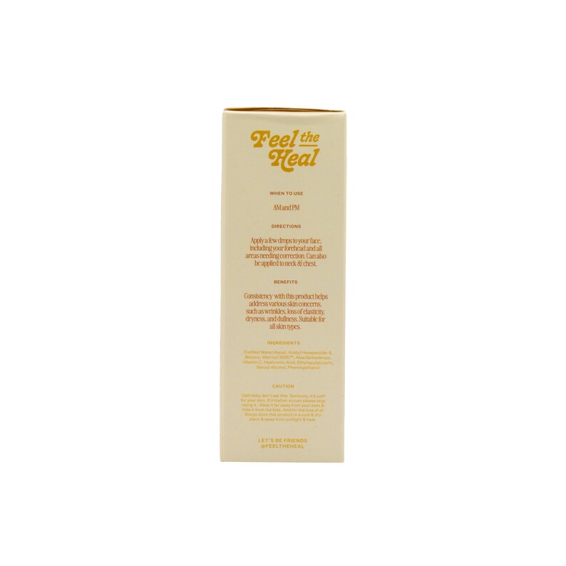 May include: A beige skincare product box with the words "Feel the Heal" in a retro font. The box contains product information, including directions and benefits. The text is in a dark brown color.