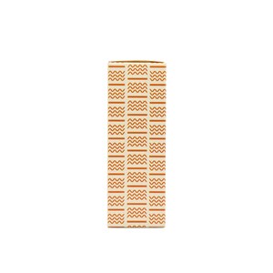 May include: A rectangular box with a repeating pattern of wavy lines and vertical stripes in shades of orange and cream. The box is standing upright against a white background.