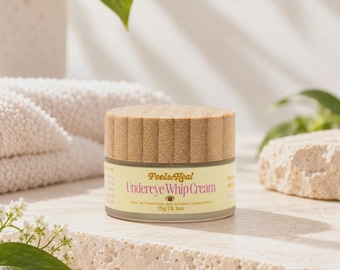 May include: A small cylindrical jar of Feels & Heal Undereye Whip Cream with a light bamboo lid. The label is pale yellow with pink text reading Undereye Whip Cream and includes the net weight of 15g | 0.53oz printed on the front of the container.