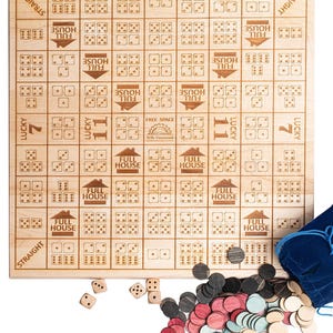 May include: A wooden game board with a grid of squares, each with a different dice combination. The board is labeled with the names of different dice combinations, such as "Full House", "Straight", and "Lucky 7". There are also a number of wooden chips and dice scattered around the board.
