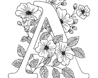 以下が含まれることがあります： 花と葉に囲まれたアルファベットのAの白黒の線画です。