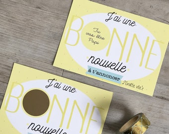 Peut inclure: Deux cartes jaunes avec le texte "J'ai une BONNE nouvelle à t'annoncer" et une zone à gratter. Le texte est en français et se traduit par "J'ai une bonne nouvelle à annoncer".