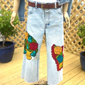 Upcycled vintage jeans, side panel jeans, wide leg jean, embroidery patches, boho jeans, faded denim, fab208nyc, upcycled jean, patched jean