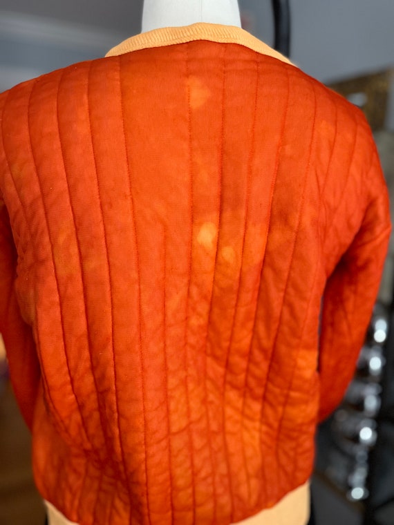 orange thermal top
