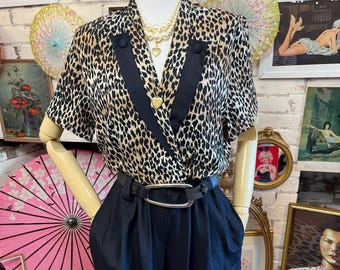 Mono negro con estampado de leopardo estilo años 80