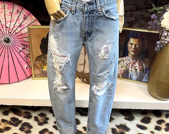 Levis de 30 pulgadas con parches y rotos